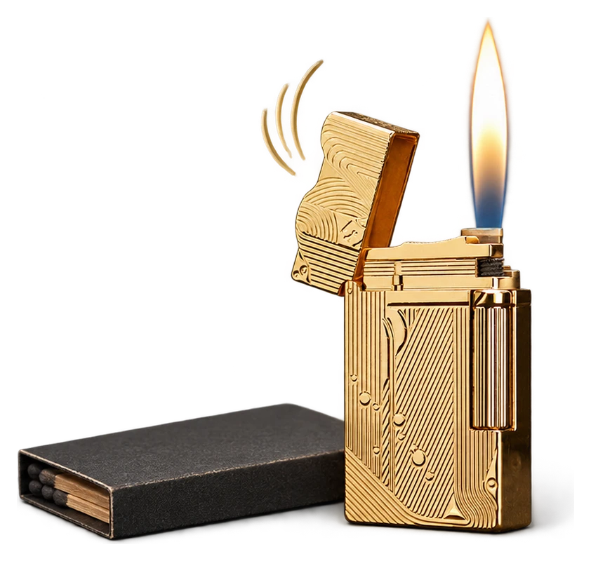 The actual engraved brass FlameSpade lighter with its lid open above a dark matchbook and fine sound marks.